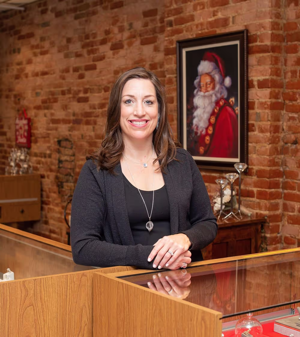 Kallie Carver, GIA-certified gemologist and owner of Silverstone Jewelers, at the front desk